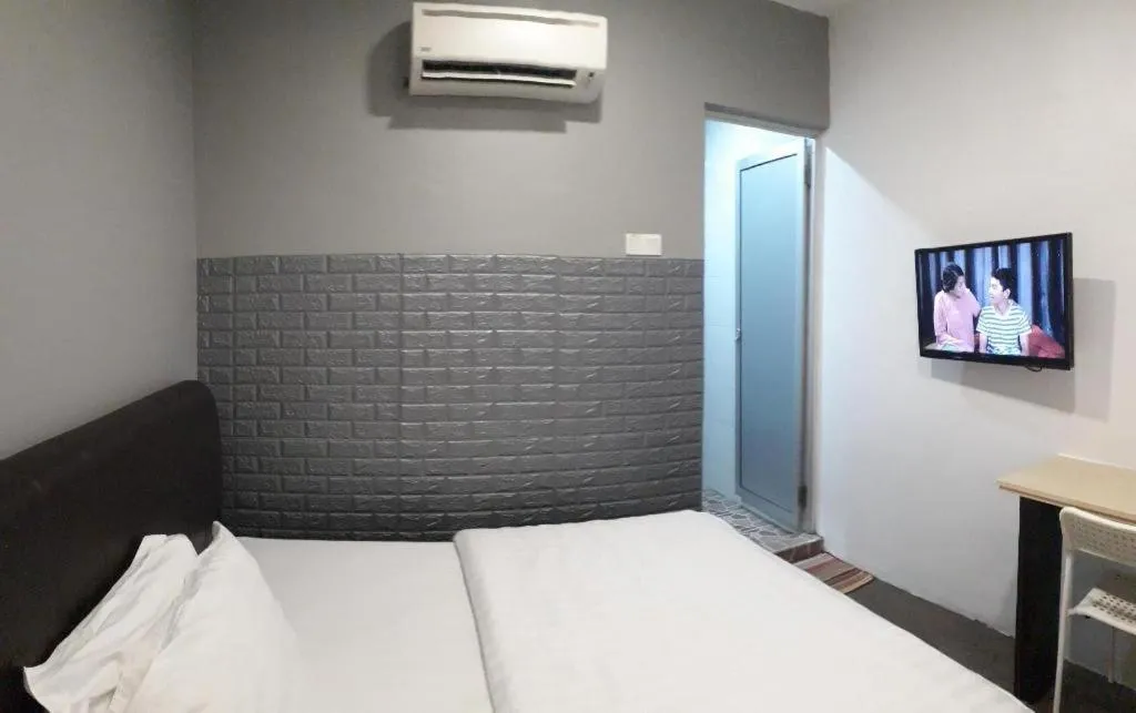 Bed in Hotel Zamburger Bentong