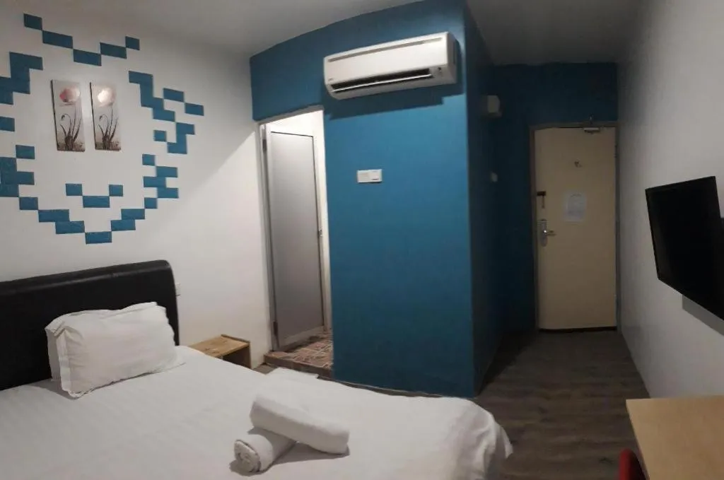 Bed in Hotel Zamburger Bentong