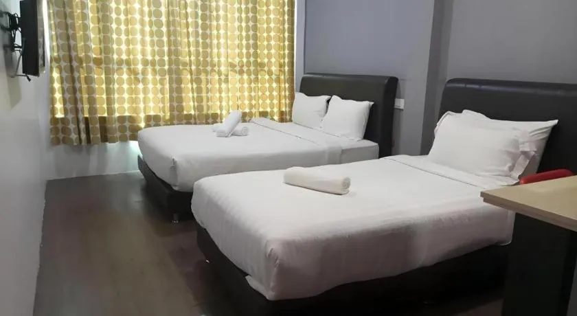 Bed in Hotel Zamburger Bentong