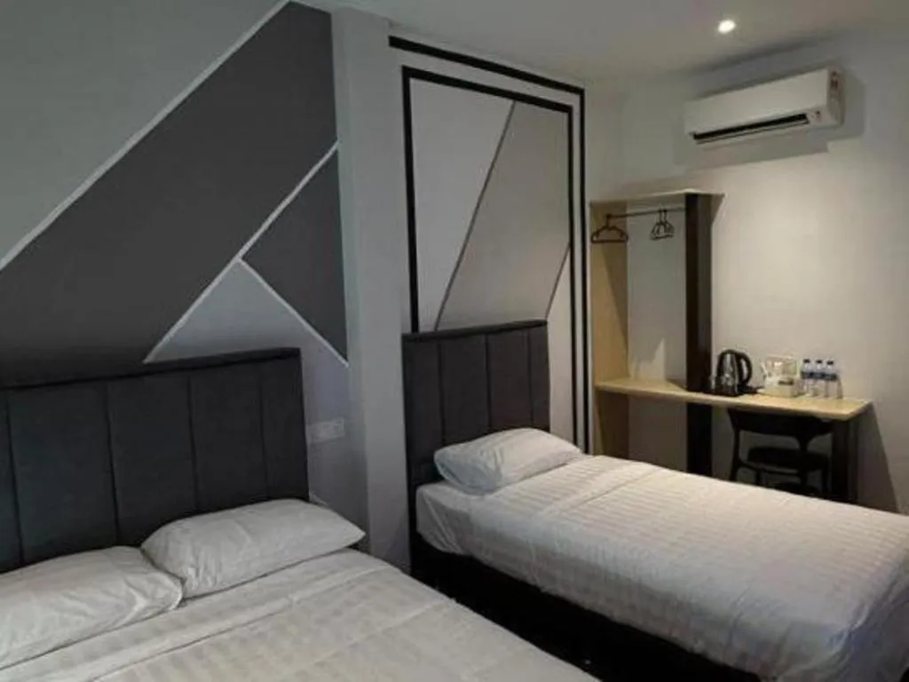 Bed in Hotel Zamburger Bentong