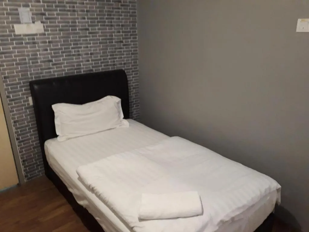 Bed in Hotel Zamburger Bentong