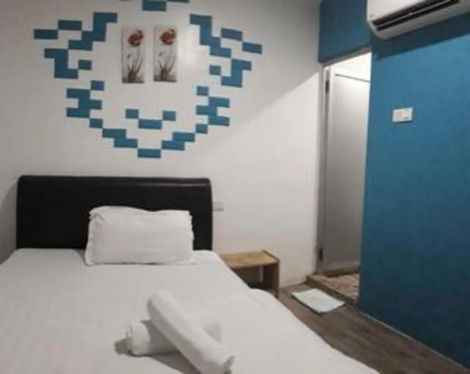 Bed in Hotel Zamburger Bentong