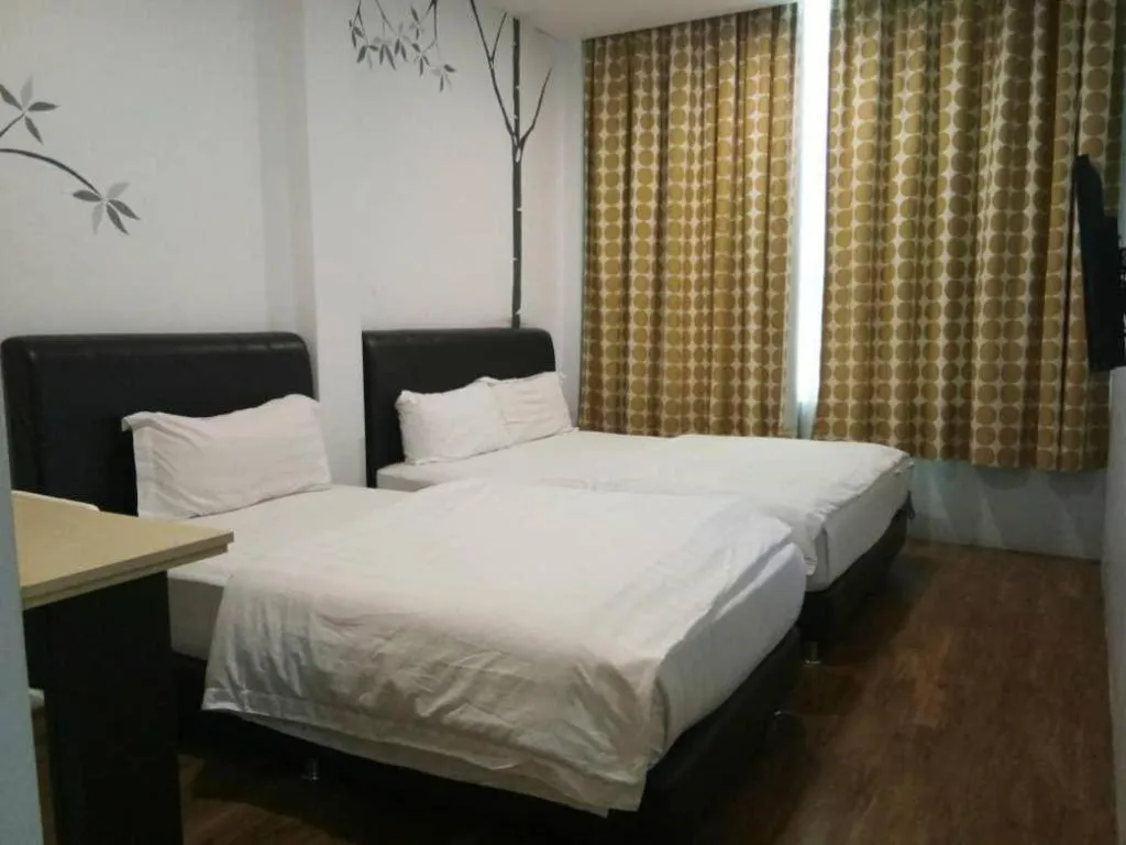 Bed in Hotel Zamburger Bentong