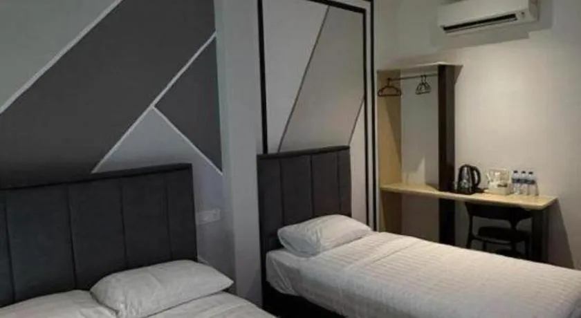 Bed in Hotel Zamburger Bentong