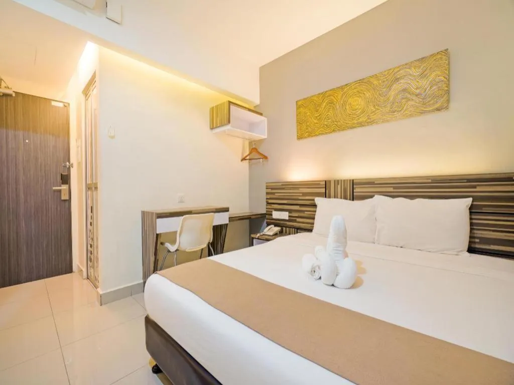 Bed in GM Holiday Hotel Permai Jaya