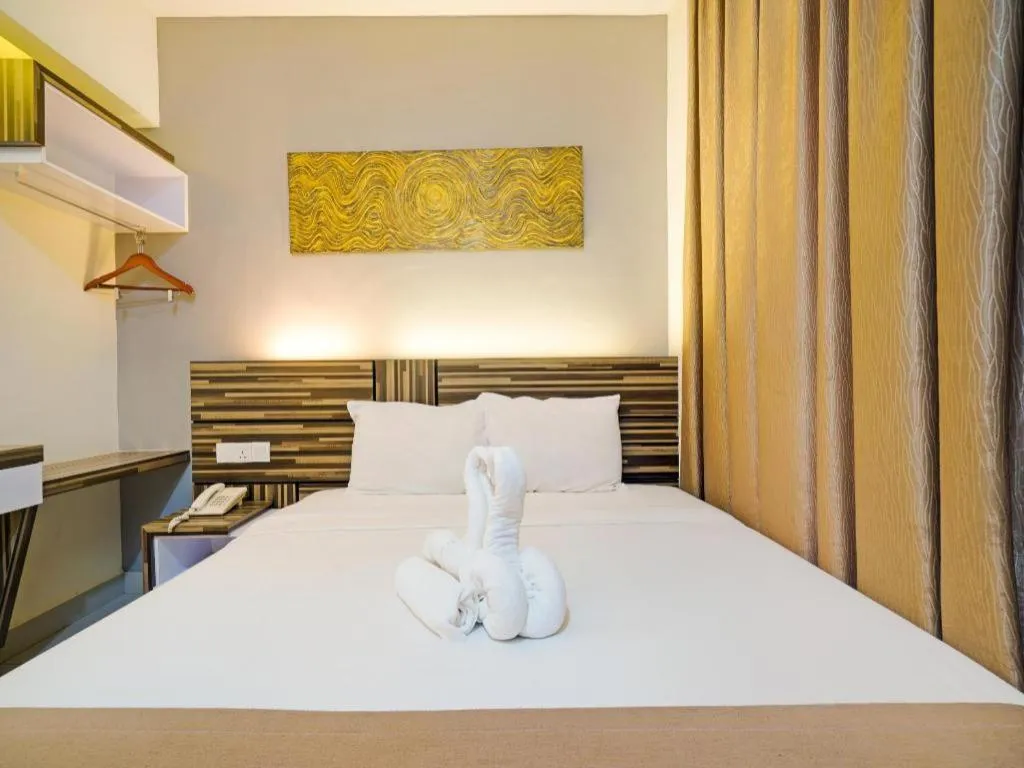 Bed in GM Holiday Hotel Permai Jaya