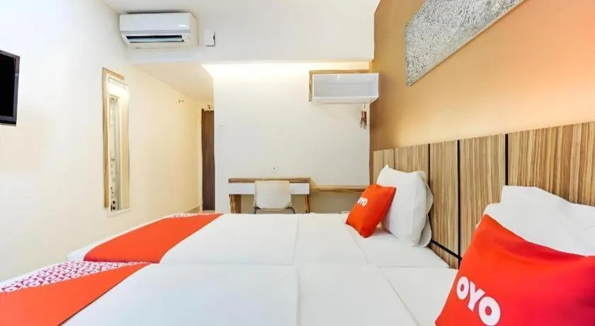 Bed in GM Holiday Hotel Permai Jaya