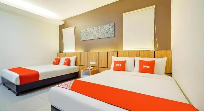 Bed in GM Holiday Hotel Permai Jaya
