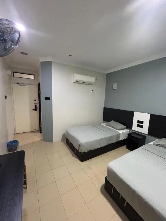 Bed in Sherrinton Hotel