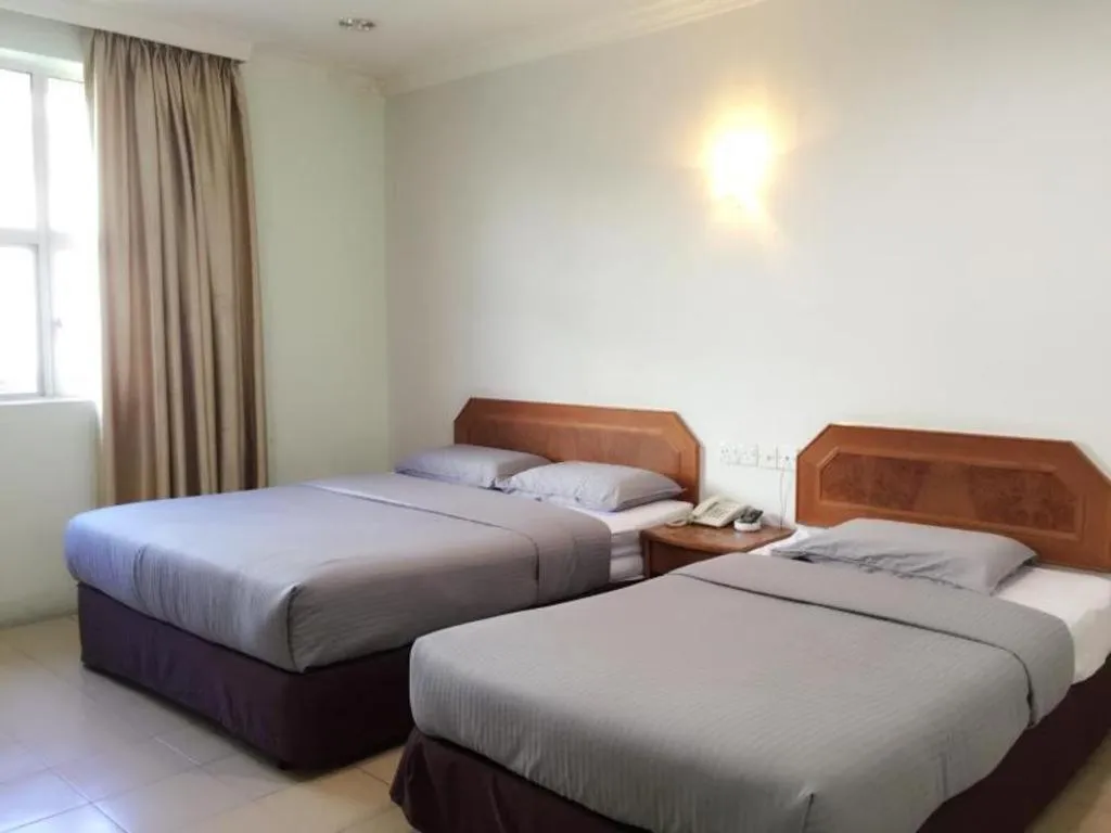 Bed in Sherrinton Hotel