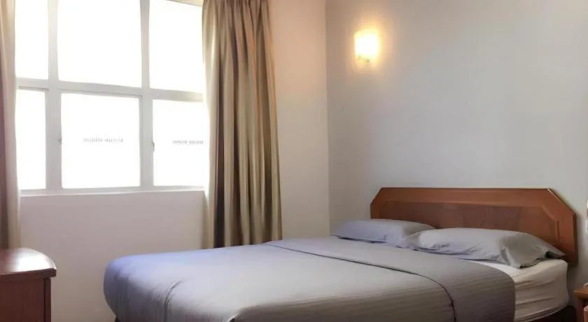 Bed in Sherrinton Hotel