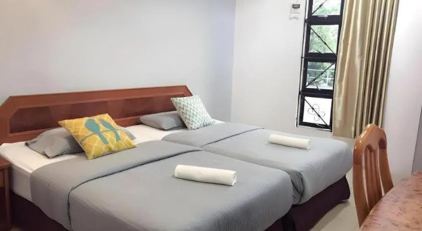 Bed in Sherrinton Hotel