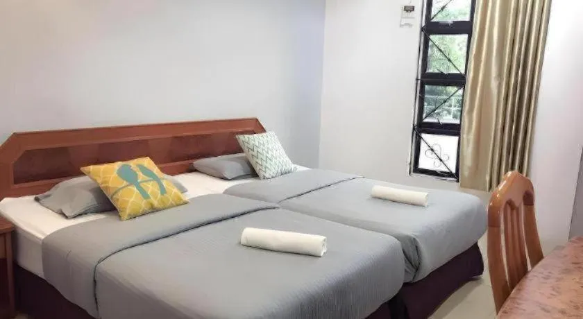 Bed in Sherrinton Hotel