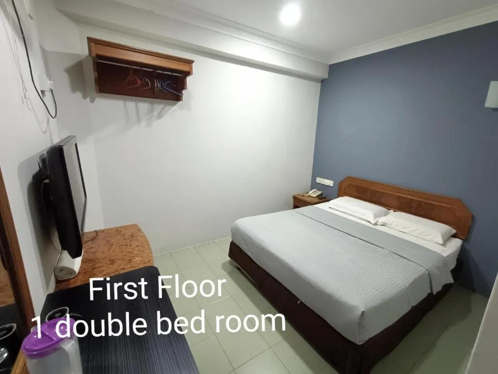 Bed in Sherrinton Hotel