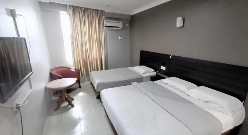 Bed in Sherrinton Hotel