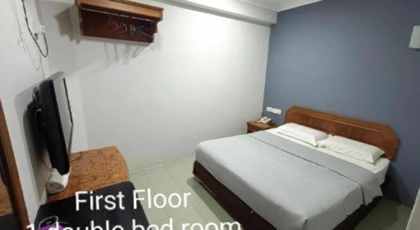 Bed in Sherrinton Hotel