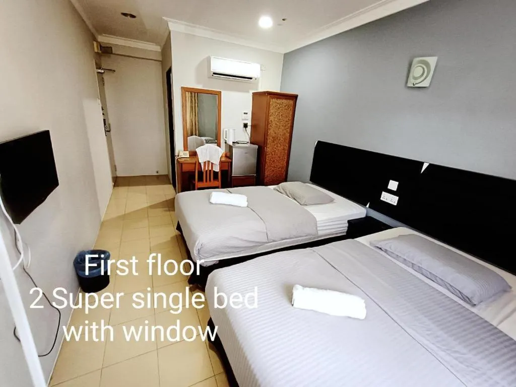 Bed in Sherrinton Hotel