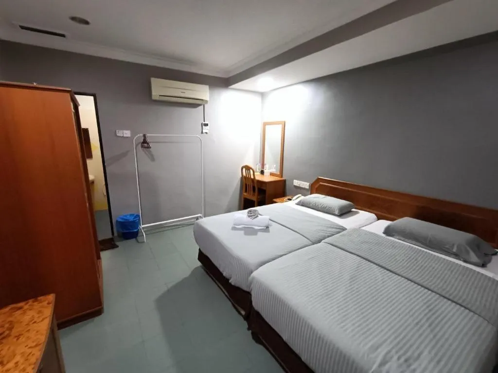 Bed in Sherrinton Hotel