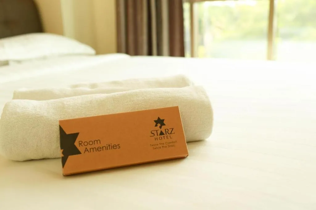 Bed in Starz Hotel
