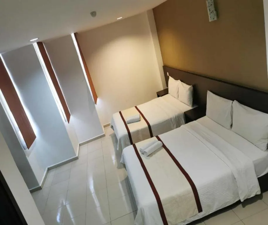 Bed in Inn Home Hotel Muar