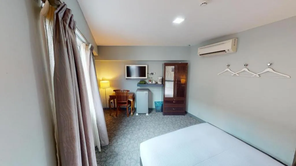 Bed in Kosma Boutique Hotel