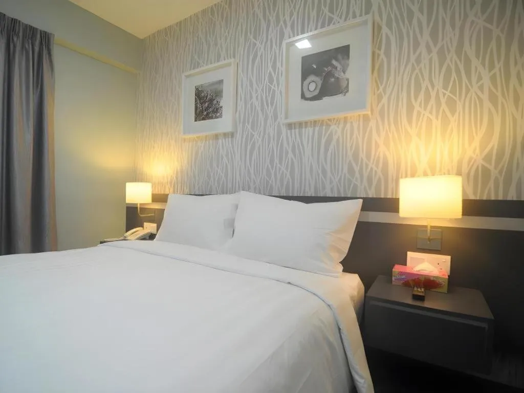 Bed in Kosma Boutique Hotel