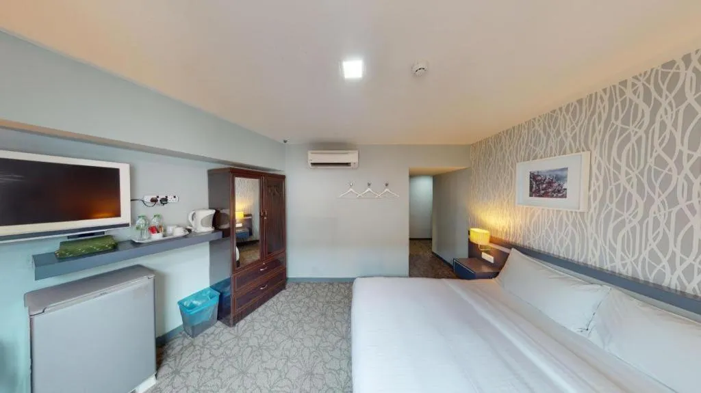 Bed in Kosma Boutique Hotel