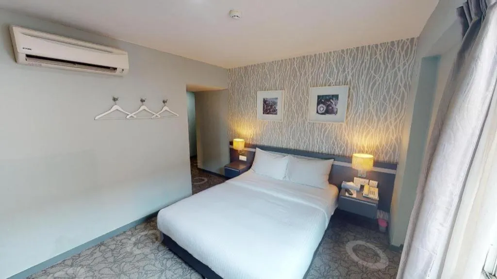 Bed in Kosma Boutique Hotel