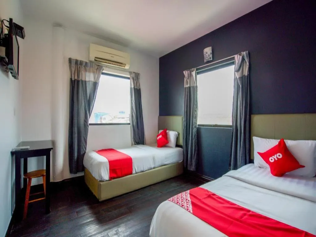 Bed in OYO 89895 Senses Budget Hotel