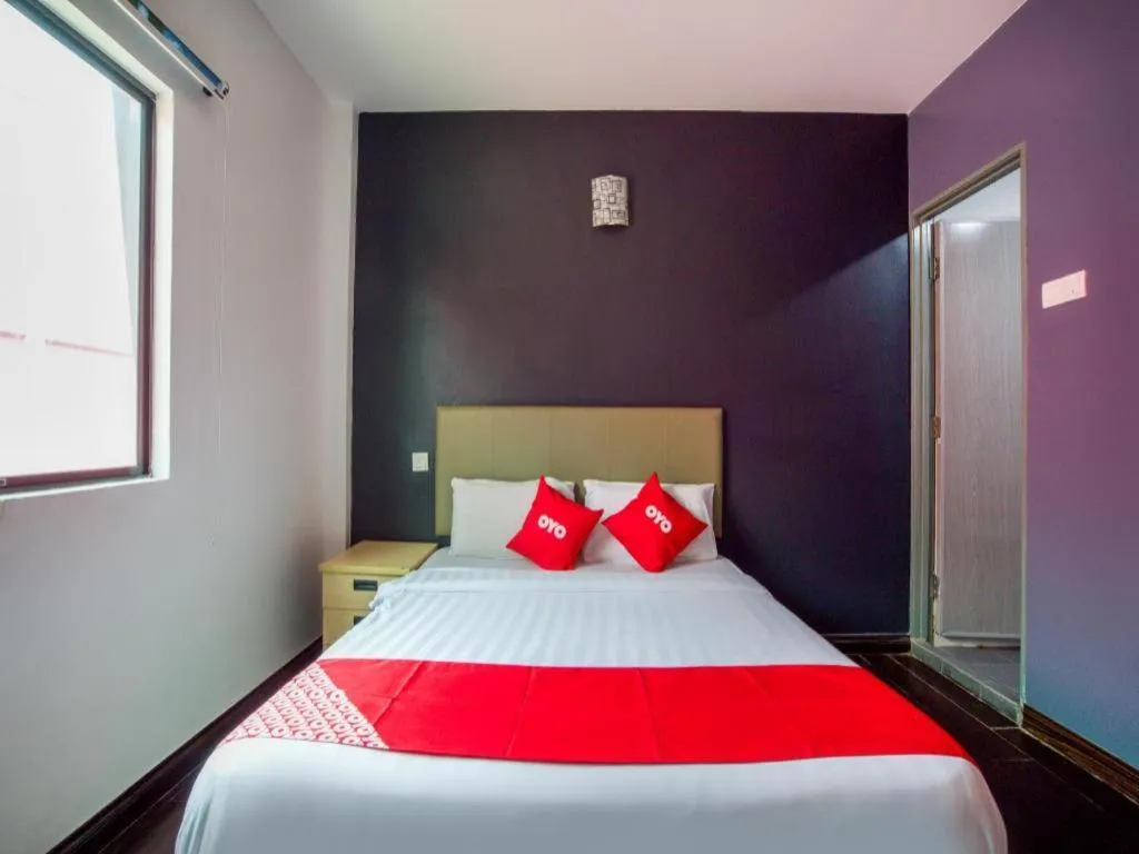 Bed in OYO 89895 Senses Budget Hotel