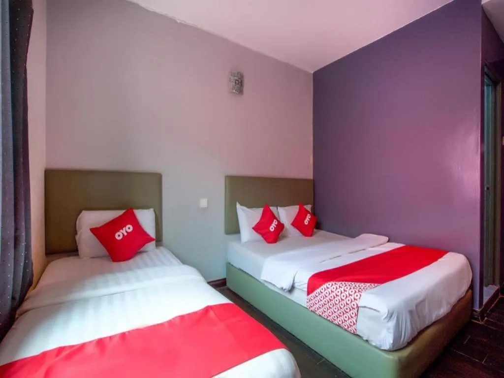 Bed in OYO 89895 Senses Budget Hotel