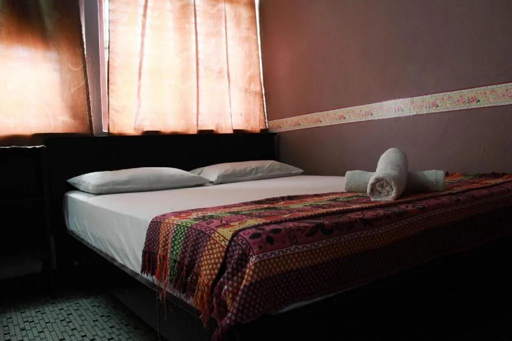 Bed in Sun Golden Inn