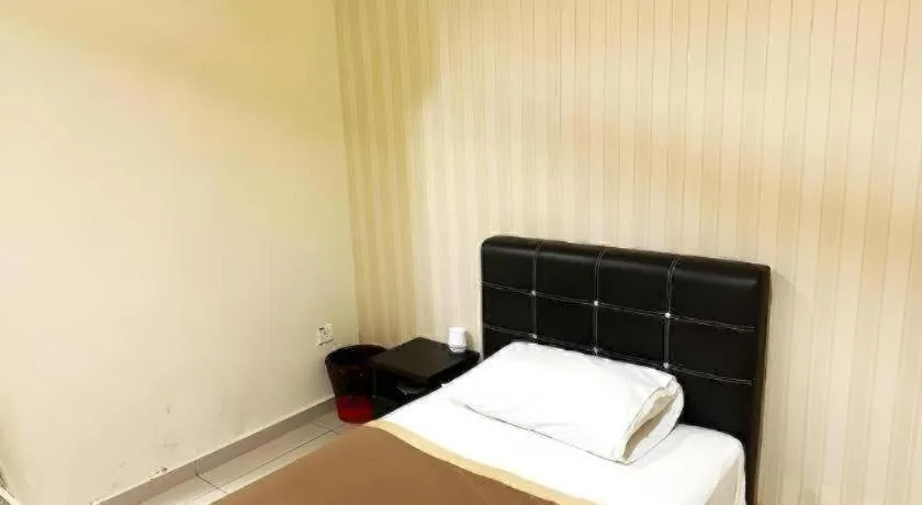 Bed in RST Hotel