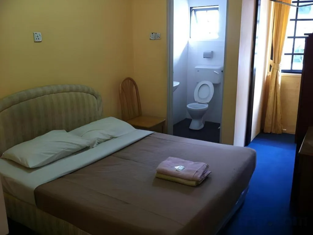 Bed in Camlodge Budget Hotel