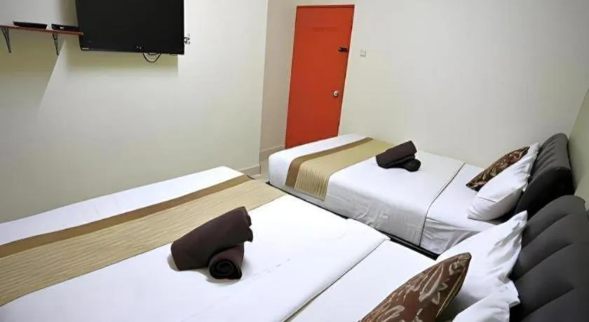 Bed in Camlodge Budget Hotel