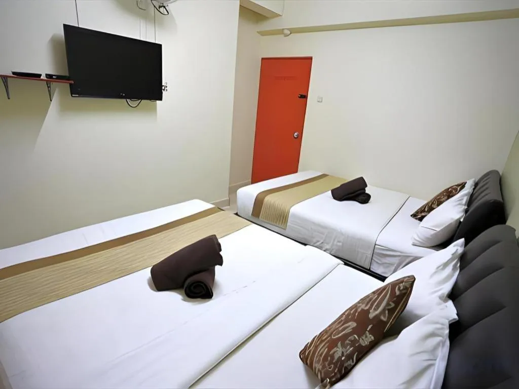 Bed in Camlodge Budget Hotel