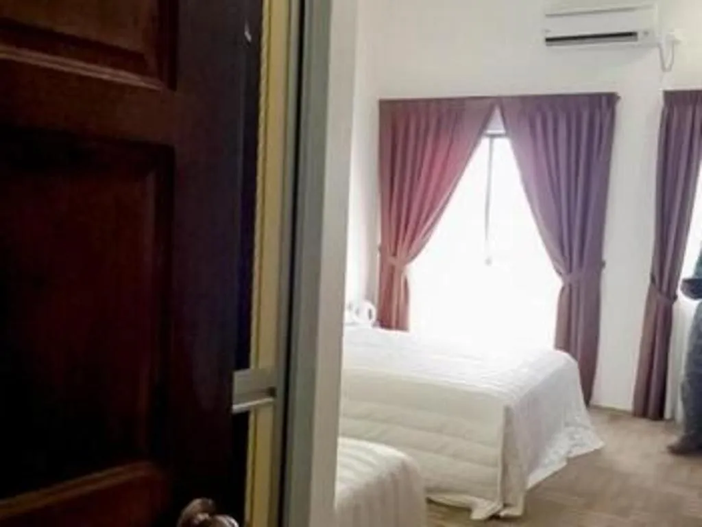 Bed in Sportfishing Hotel