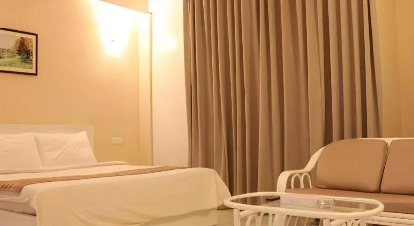 Bed in Stallions Suites Penang