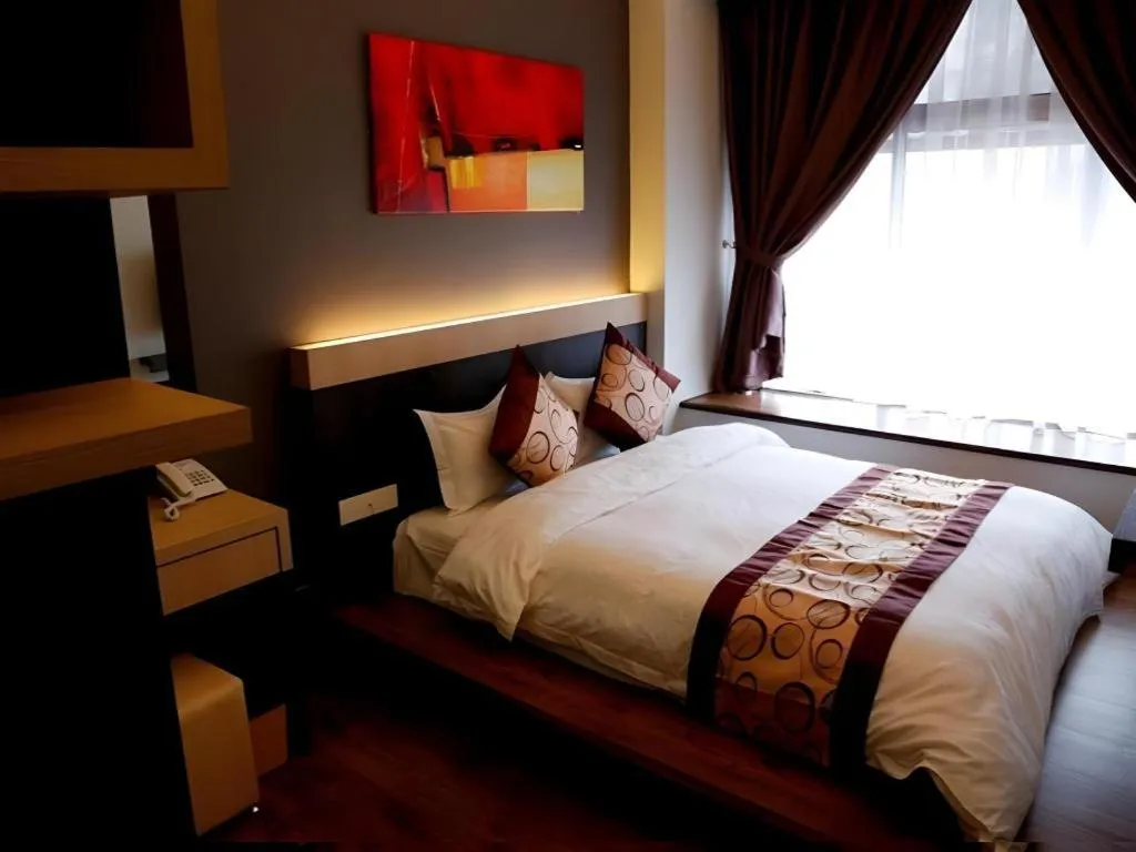 Bed in Lot 10 Boutique Hotel