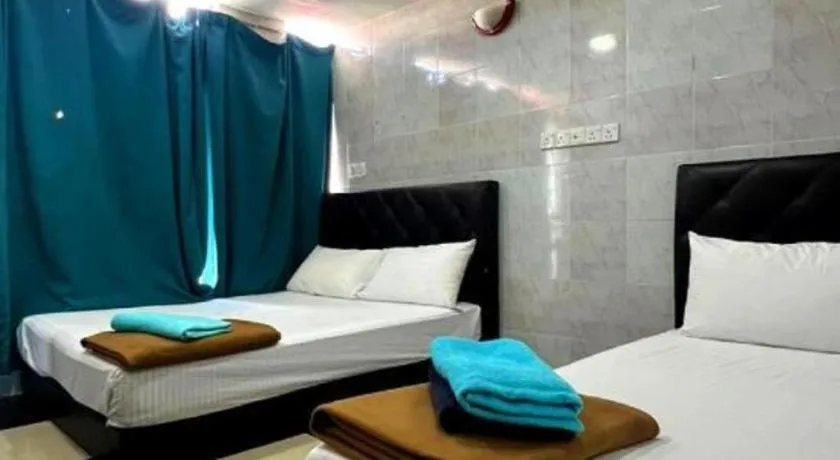 Bed in Bukit Beruntung Business Hotel