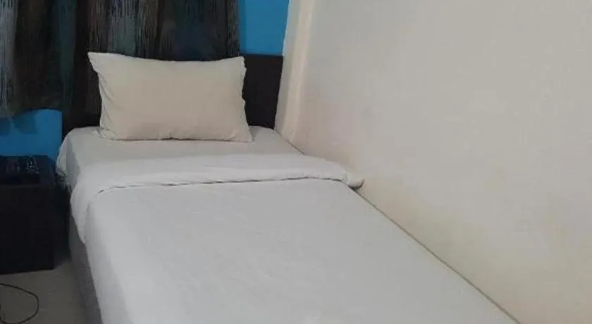 Bed in Hotel Grand Mutiara