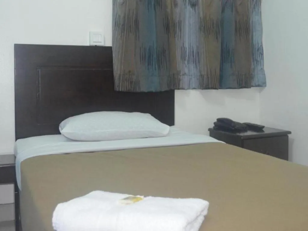 Bed in Hotel Grand Mutiara