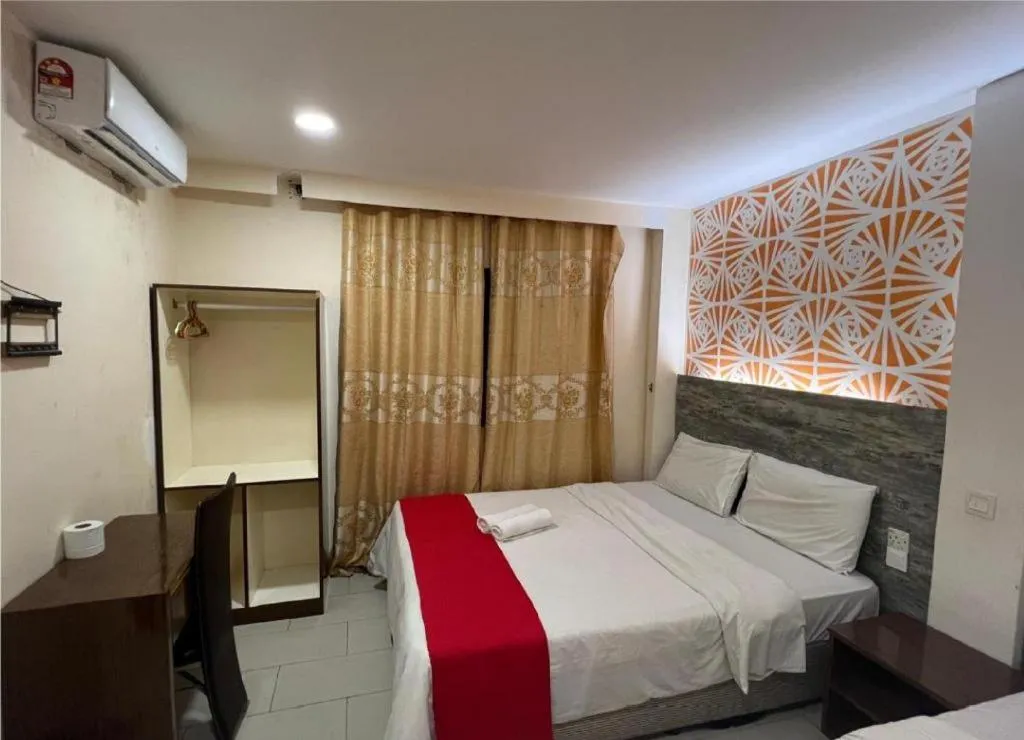 Bed in Hotel Grand Mutiara