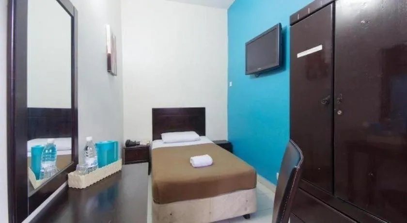 Bed in Hotel Grand Mutiara