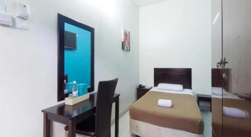 Bed in Hotel Grand Mutiara