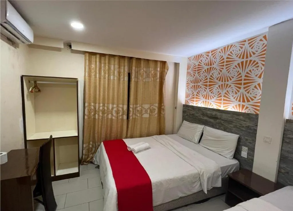 Bed in Hotel Grand Mutiara