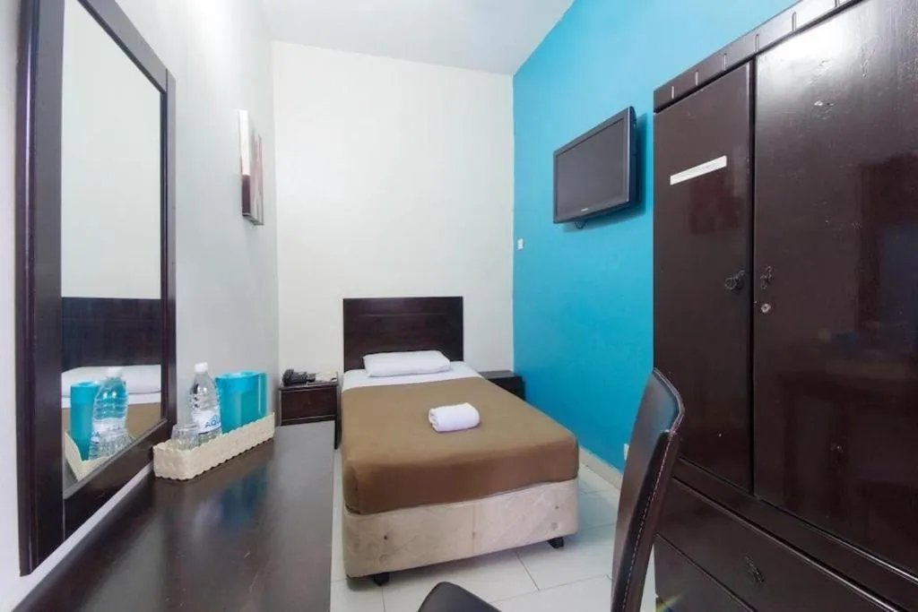 Bed in Hotel Grand Mutiara