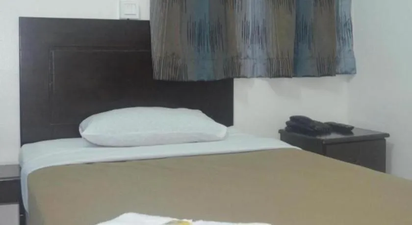 Bed in Hotel Grand Mutiara