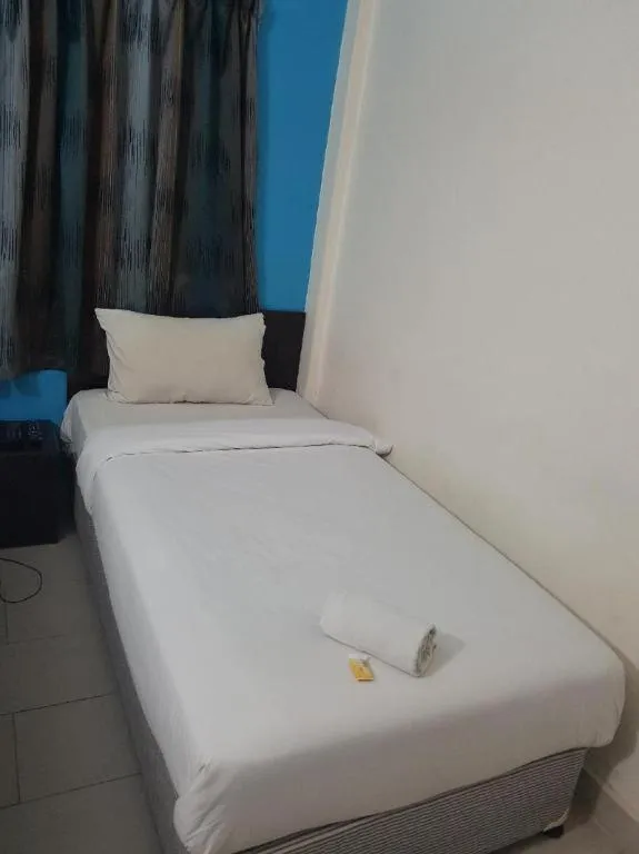 Bed in Hotel Grand Mutiara
