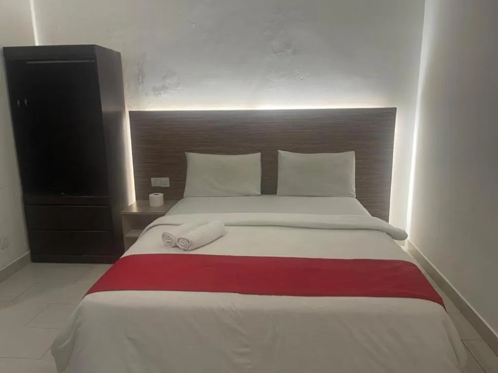 Bed in Hotel Grand Mutiara